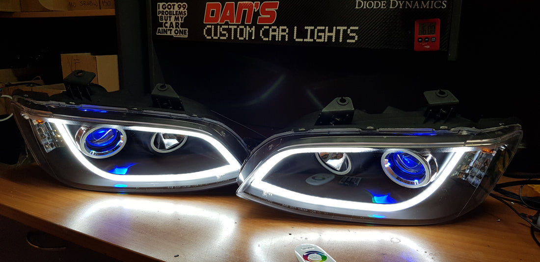 Holden VE Commodore S1/S2 DRL Style Headlights with Multicoloured Halo Rings and Demon Eyes - Dan's Custom Car Lights 