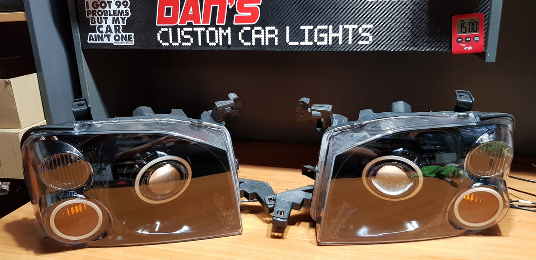 Nissan Navarra D22 Headlights with Quad Multicoloured Halo Rings - Dan's Custom Car Lights 