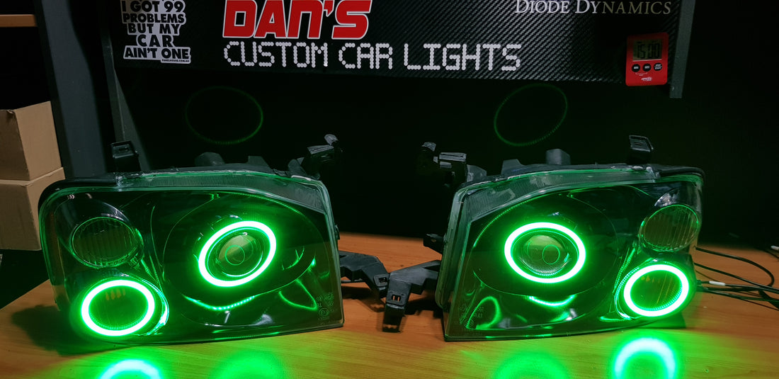 Nissan Navarra D22 Headlights with Quad Multicoloured Halo Rings - Dan's Custom Car Lights 