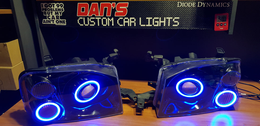 Nissan Navarra D22 Headlights with Quad Multicoloured Halo Rings - Dan's Custom Car Lights 
