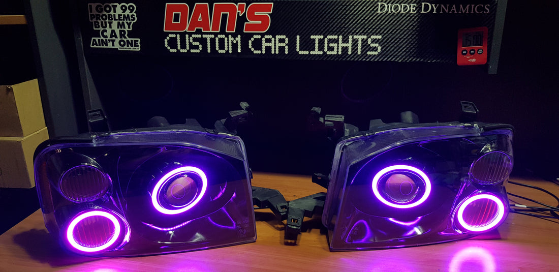 Nissan Navarra D22 Headlights with Quad Multicoloured Halo Rings - Dan's Custom Car Lights 
