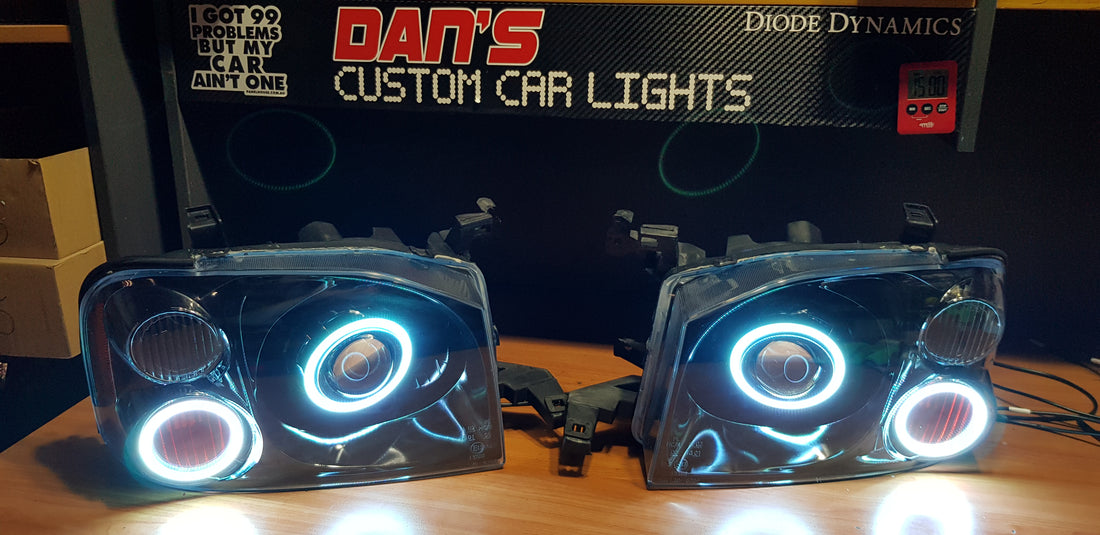 Nissan Navarra D22 Headlights with Quad Multicoloured Halo Rings - Dan's Custom Car Lights 