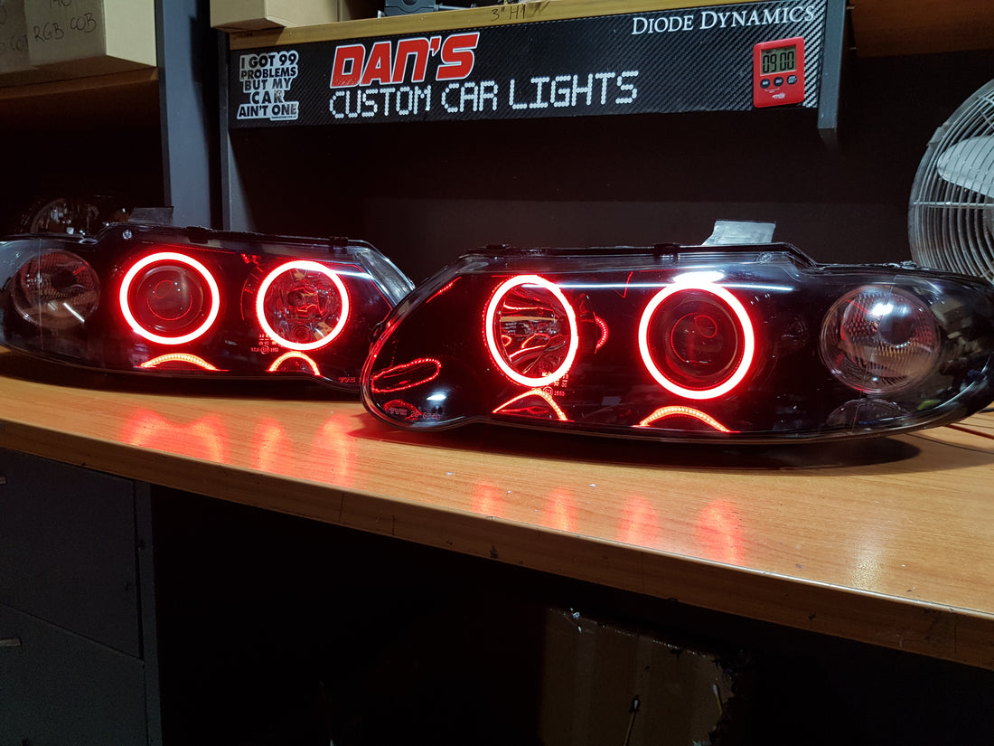 Holden VX VU Altezza Headlights with Multicolored Halo Rings - Dan's Custom Car Lights 
