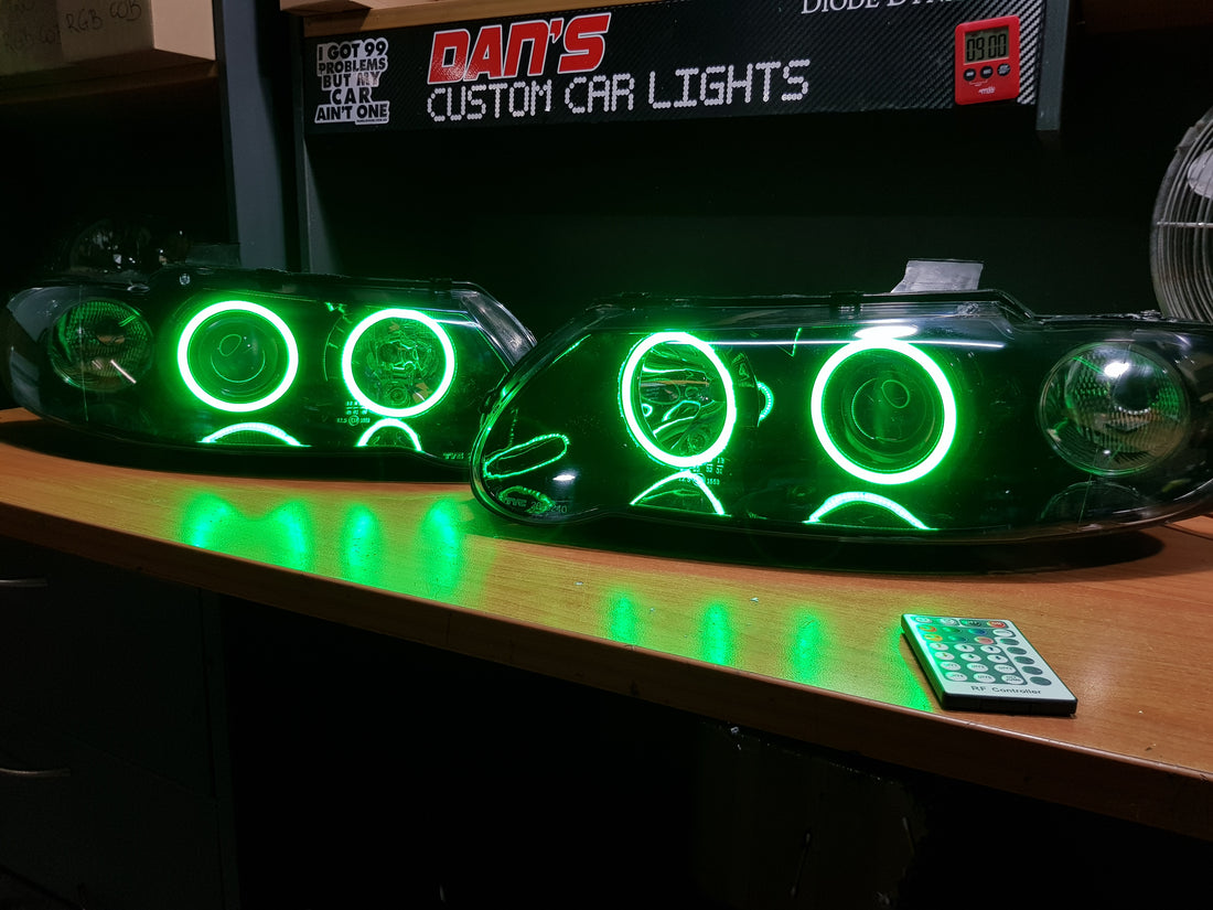 Holden VX VU Altezza Headlights with Multicolored Halo Rings - Dan's Custom Car Lights 