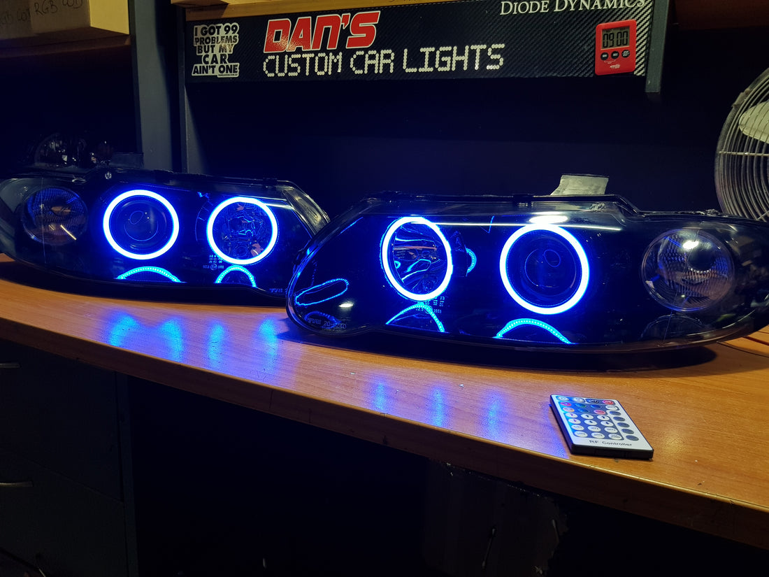 Holden VX VU Altezza Headlights with Multicolored Halo Rings - Dan's Custom Car Lights 