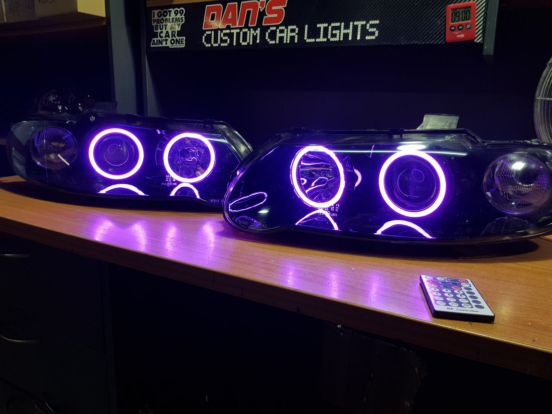 Holden VX VU Altezza Headlights with Multicolored Halo Rings - Dan's Custom Car Lights 