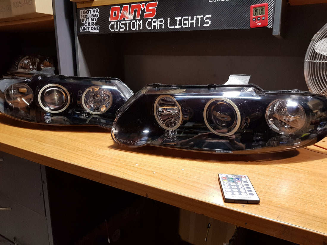 Holden VX VU Altezza Headlights with Multicolored Halo Rings - Dan's Custom Car Lights 