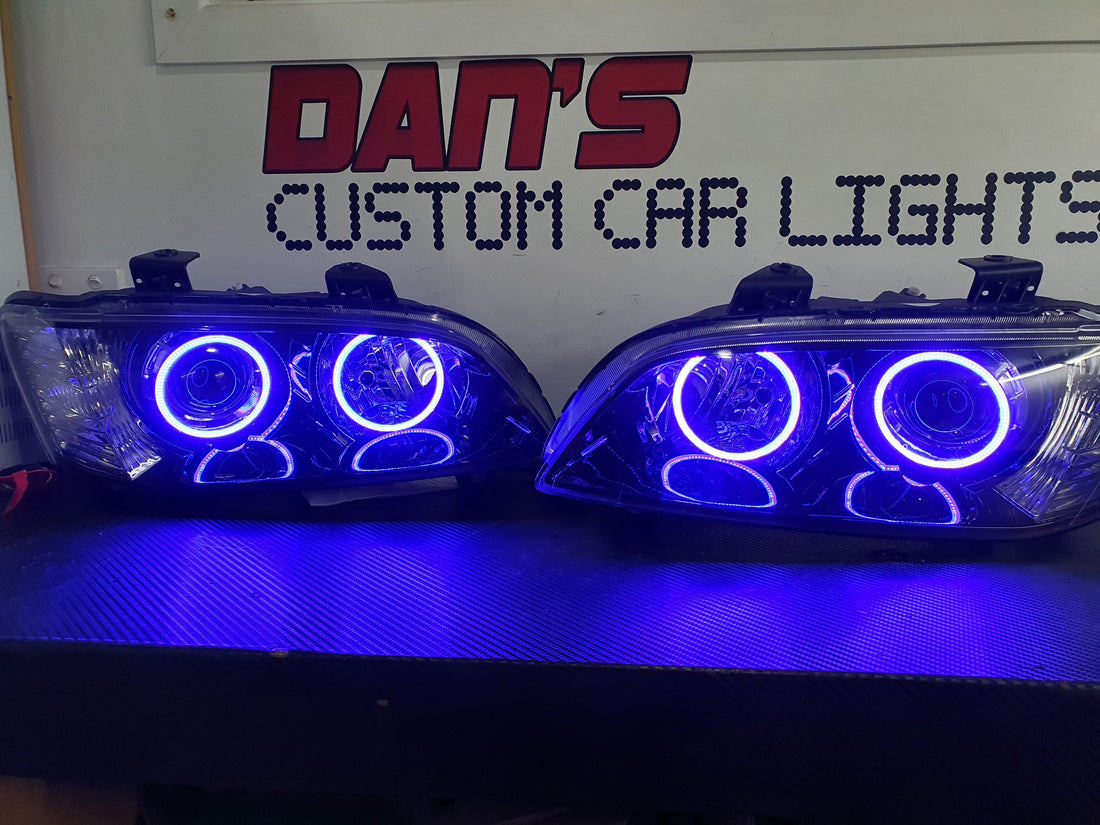 Holden VE Commodore S1 Projector Headlights with Multicoloured Halo Rings - Dan's Custom Car Lights 