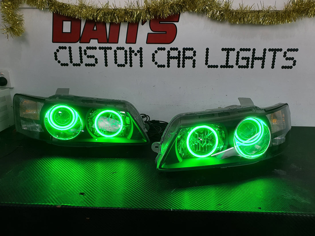 Holden VZ Commodore Projector Headlights with Multicolored Halo Rings - Dan's Custom Car Lights 