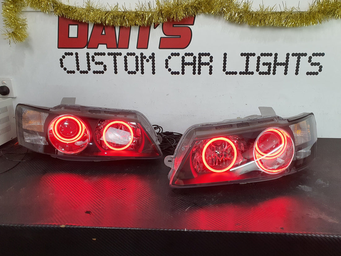 Holden VZ Commodore Projector Headlights with Multicolored Halo Rings - Dan's Custom Car Lights 