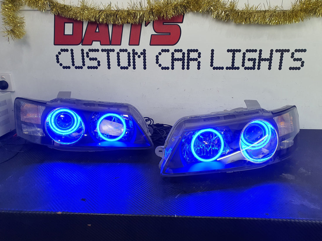 Holden VZ Commodore Projector Headlights with Multicolored Halo Rings - Dan's Custom Car Lights 