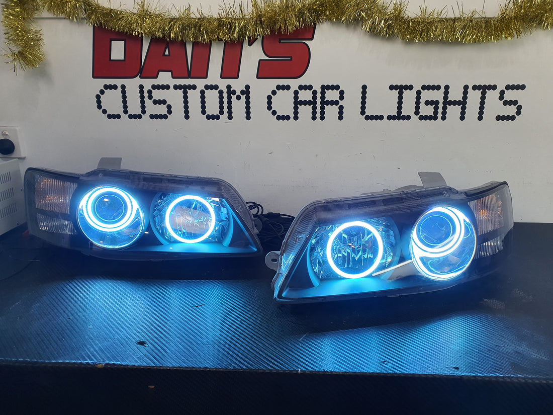 Holden VZ Commodore Projector Headlights with Multicolored Halo Rings - Dan's Custom Car Lights 