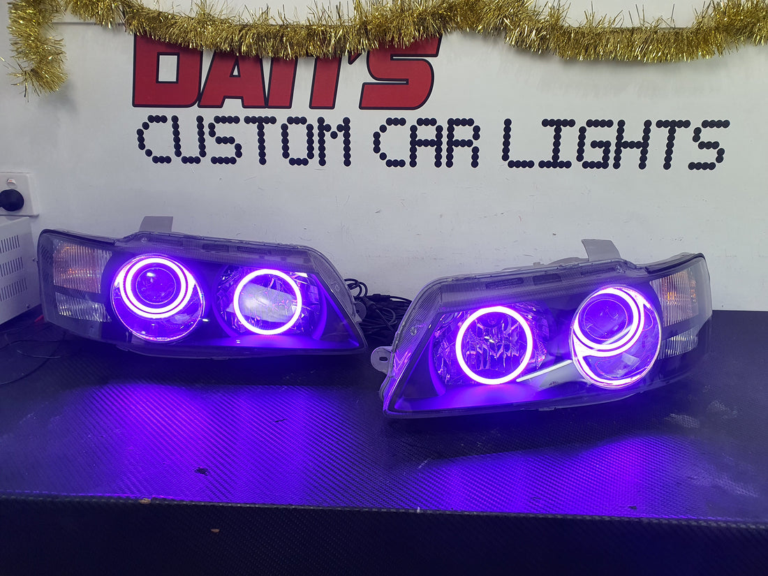 Holden VZ Commodore Projector Headlights with Multicolored Halo Rings - Dan's Custom Car Lights 