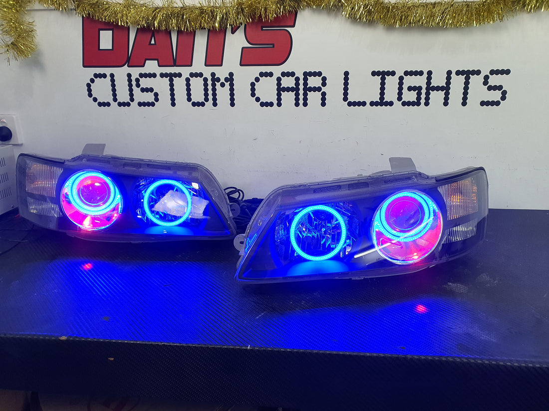 Holden VZ Commodore Projector Headlights with Multicolored Halorings and Demon Eyes - Dan's Custom Car Lights 