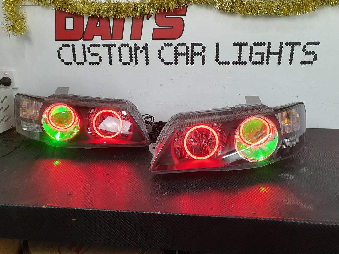 Holden VZ Commodore Projector Headlights with Multicolored Halorings and Demon Eyes - Dan's Custom Car Lights 