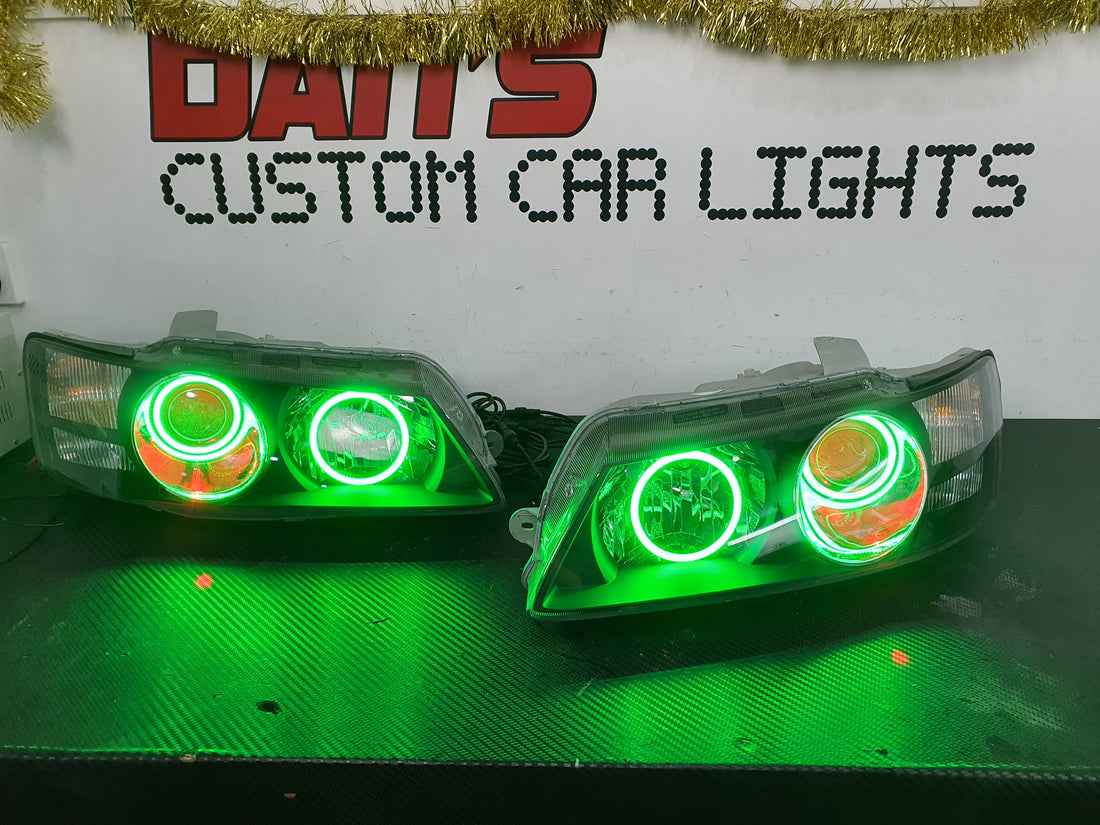 Holden VZ Commodore Projector Headlights with Multicolored Halorings and Demon Eyes - Dan's Custom Car Lights 