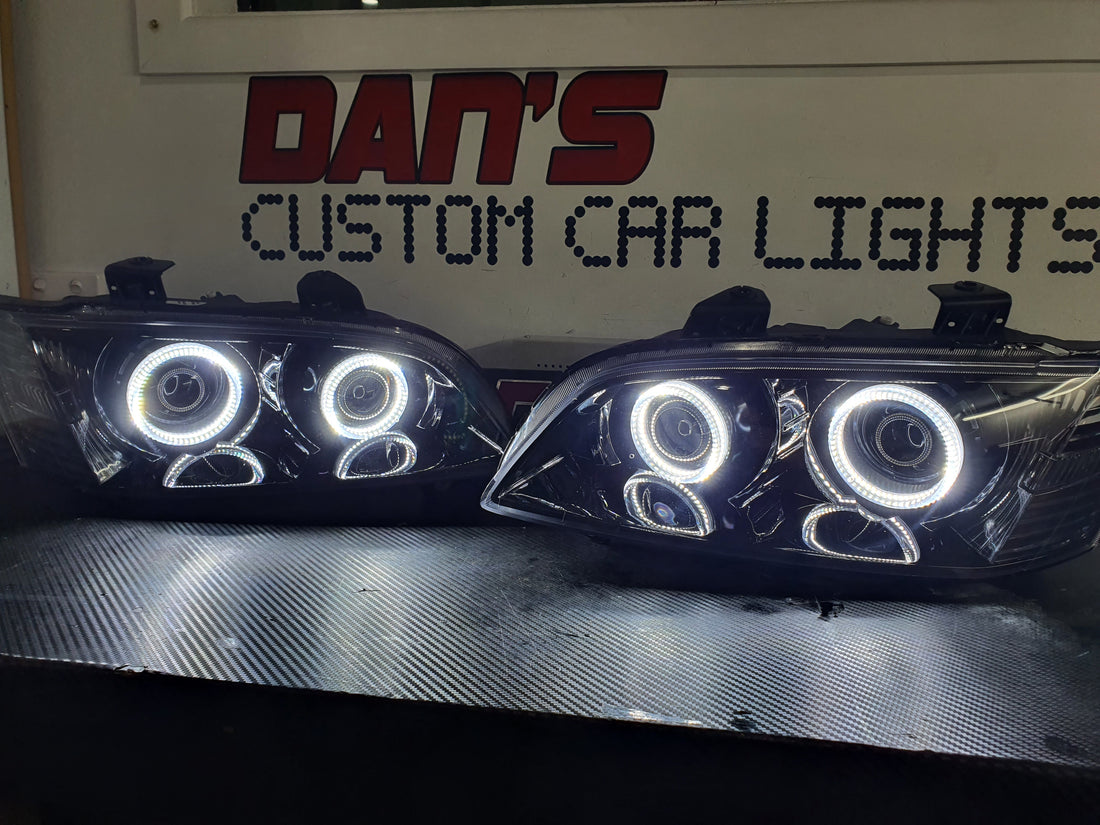 Holden VE Commodore S1 with Quad Projectors and White/Amber Halorings - Dan's Custom Car Lights 