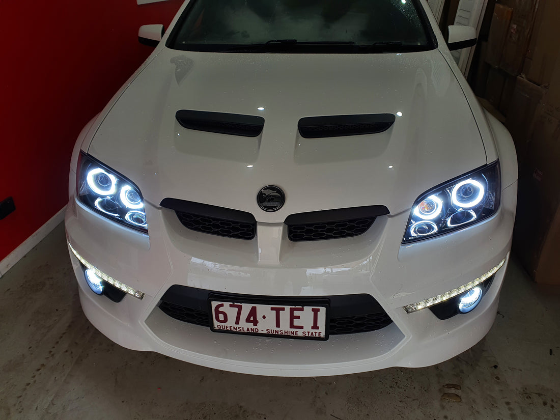 Holden VE Commodore S1 with Quad Projectors and White/Amber Halorings - Dan's Custom Car Lights 