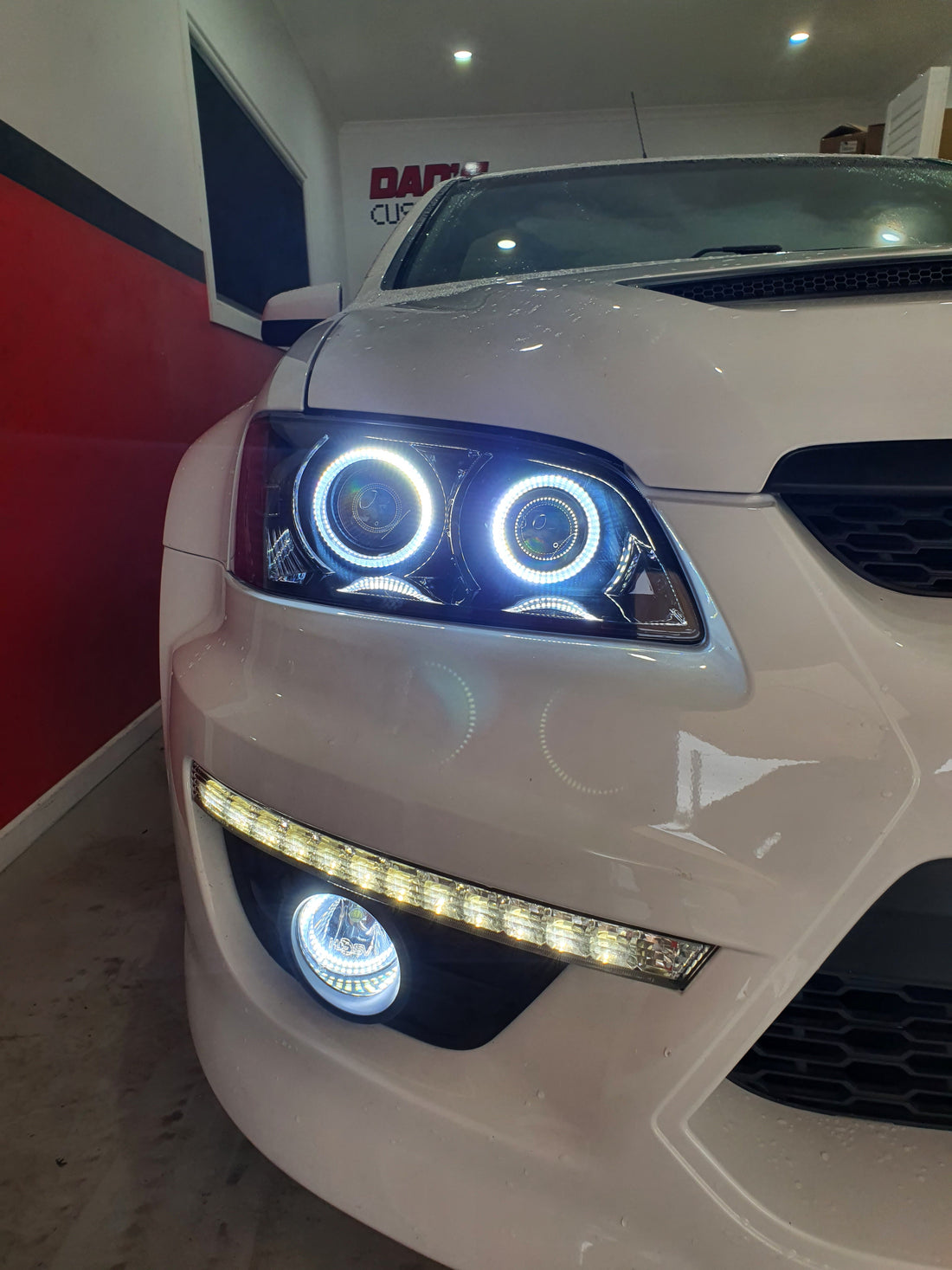 Holden VE Commodore S1 with Quad Projectors and White/Amber Halorings - Dan's Custom Car Lights 