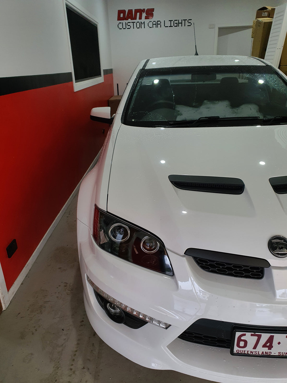 Holden VE Commodore S1 with Quad Projectors and White/Amber Halorings - Dan's Custom Car Lights 