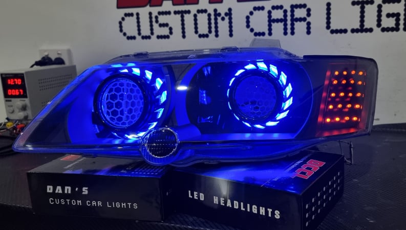 Holden Commodore VY with Quad Multicoloured Halo rings, Projectors, Honeycomb Lens Etching & Custom orange LED Blinkers - Dan's Custom Car Lights 