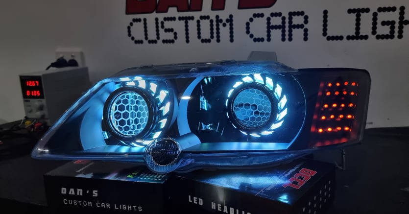 Holden Commodore VY with Quad Multicoloured Halo rings, Projectors, Honeycomb Lens Etching & Custom orange LED Blinkers - Dan's Custom Car Lights 