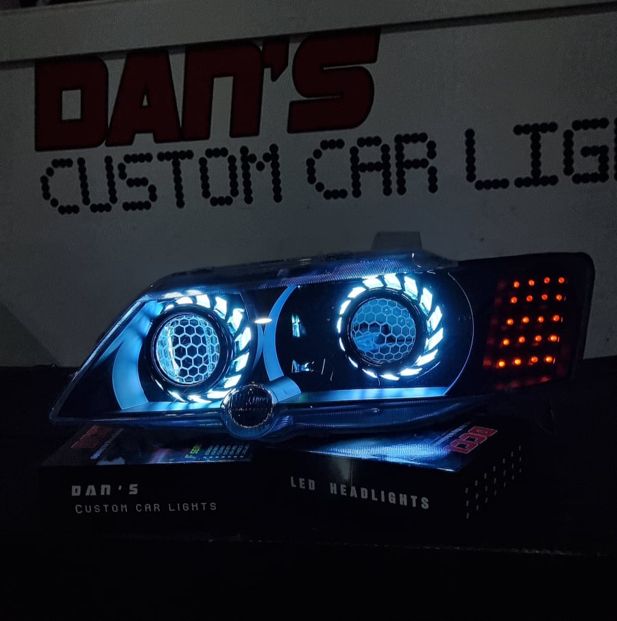 Holden Commodore VY with Quad Multicoloured Halo rings, Projectors, Honeycomb Lens Etching & Custom orange LED Blinkers - Dan's Custom Car Lights 