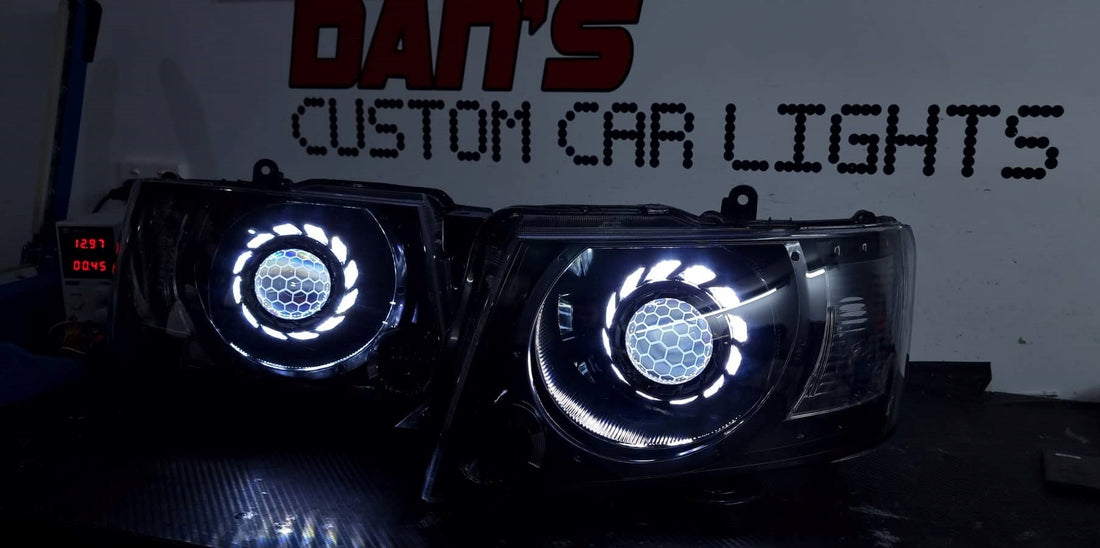Nissan Patrol GU S4 2004-16 Headlights with Projectors and Turbine Shrouds, White/Amber Halo rings and "HONEYCOMB" Projector Lens Etching - Dan's Custom Car Lights 