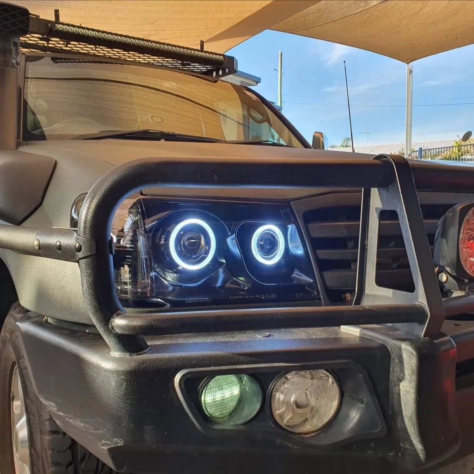 Toyota Landcruiser 100 series Headlights with Quad White/ Amber Halorings and Quad Projector - Dan's Custom Car Lights 