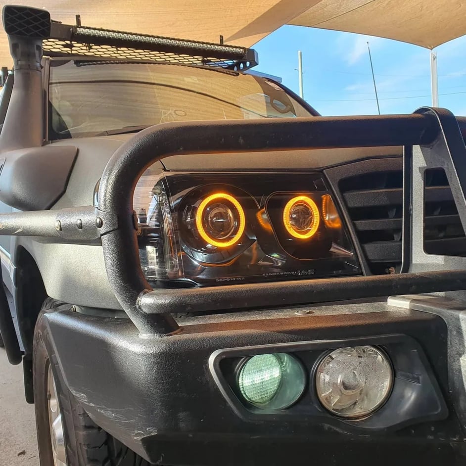 Toyota Landcruiser 100 series Headlights with Quad White/ Amber Halorings and Quad Projector - Dan's Custom Car Lights 