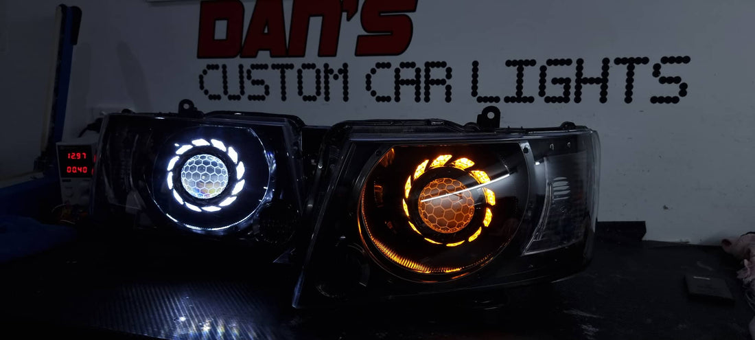 Nissan Patrol GU S4 2004-16 Headlights with Projectors and Turbine Shrouds, White/Amber Halo rings and "HONEYCOMB" Projector Lens Etching - Dan's Custom Car Lights 