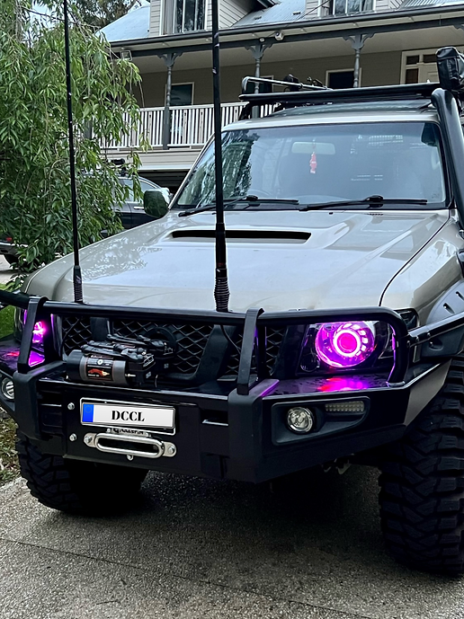 Nissan Patrol GU S4 Headlights BiLED Projectors, Turbine Shroud, Dual Multicolored Halo Rings, and Demon Eyes - Dan's Custom Car Lights 