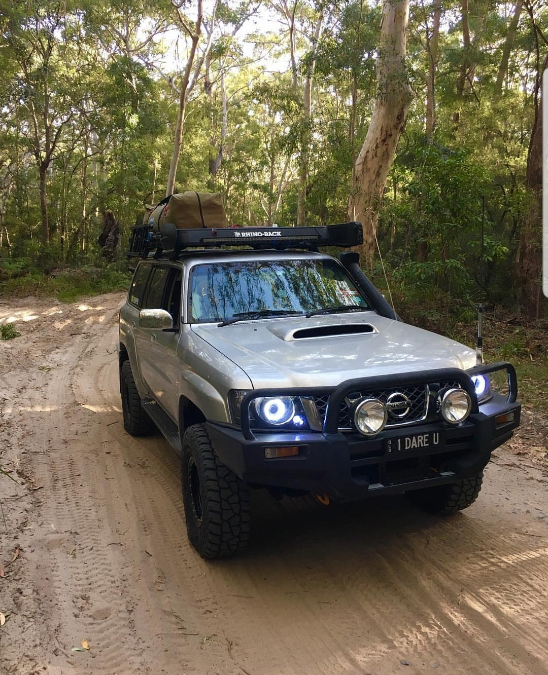 Nissan Patrol GU S4 Headlights with White/Amber Halo Rings and Projectors - Dan's Custom Car Lights 