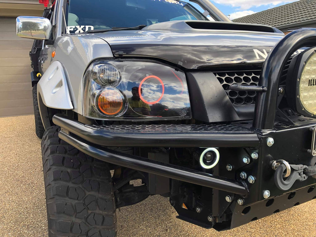 Nissan Navarra D22 Headlights with Multicoloured Halo Rings - Dan's Custom Car Lights 