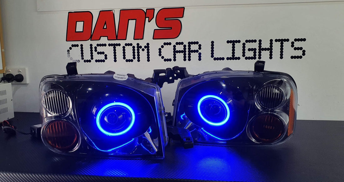 Nissan Navarra D22 Headlights with Multicoloured Halo Rings - Dan's Custom Car Lights 