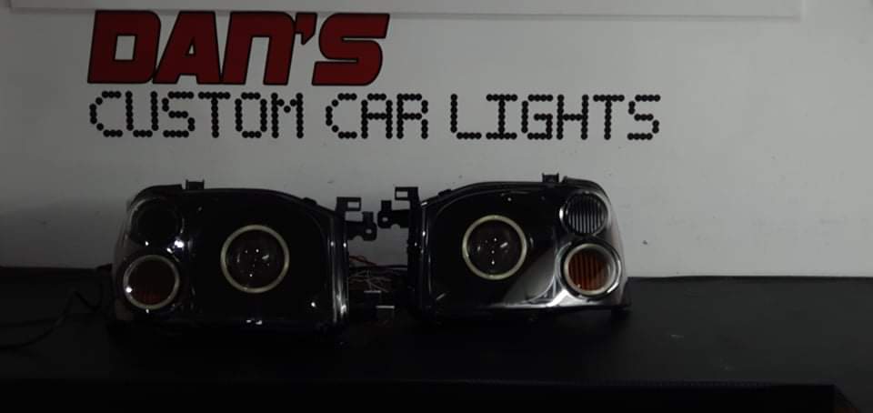Nissan Navara D22 Headlights with Projector and Quad White/Amber Halo rings - Dan's Custom Car Lights 