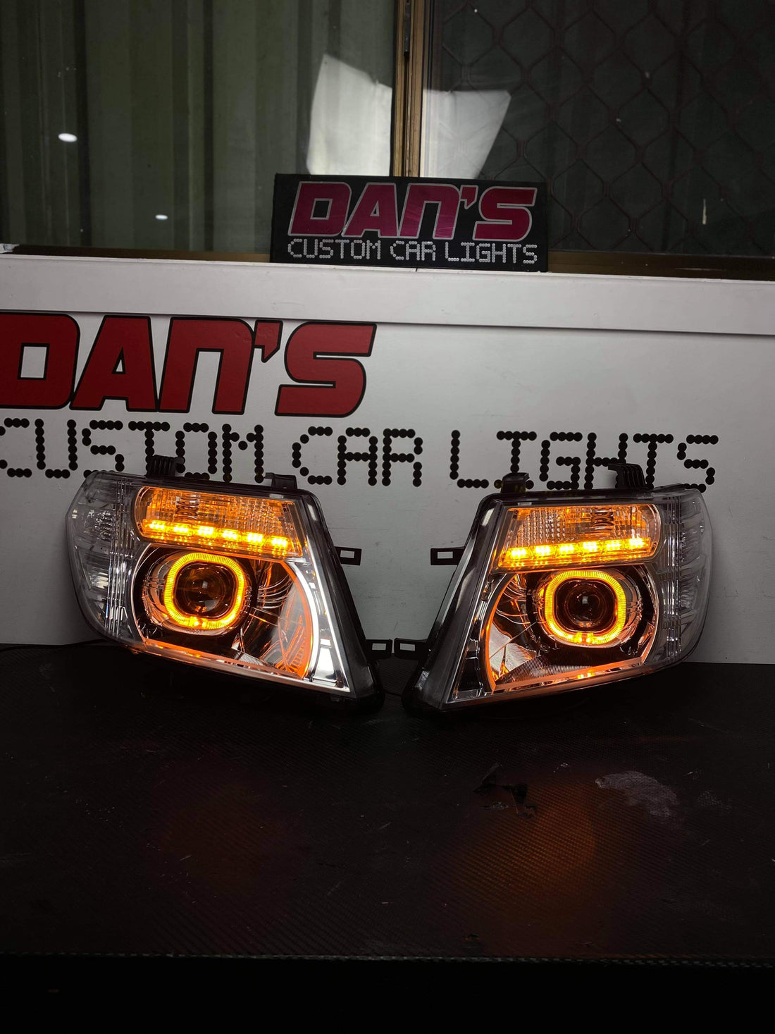 Nissan Navara D40 VSK Spain Facelift Chrome Headlights with White/Amber Halo Rings, DRLS and Projectors - Dan's Custom Car Lights 