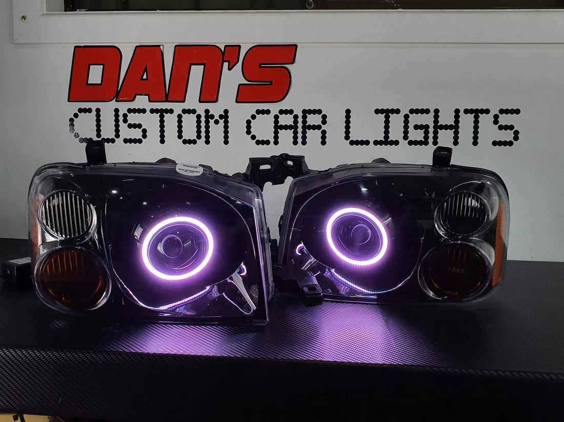 Nissan Navarra D22 Headlights with Multicoloured Halo Rings - Dan's Custom Car Lights 