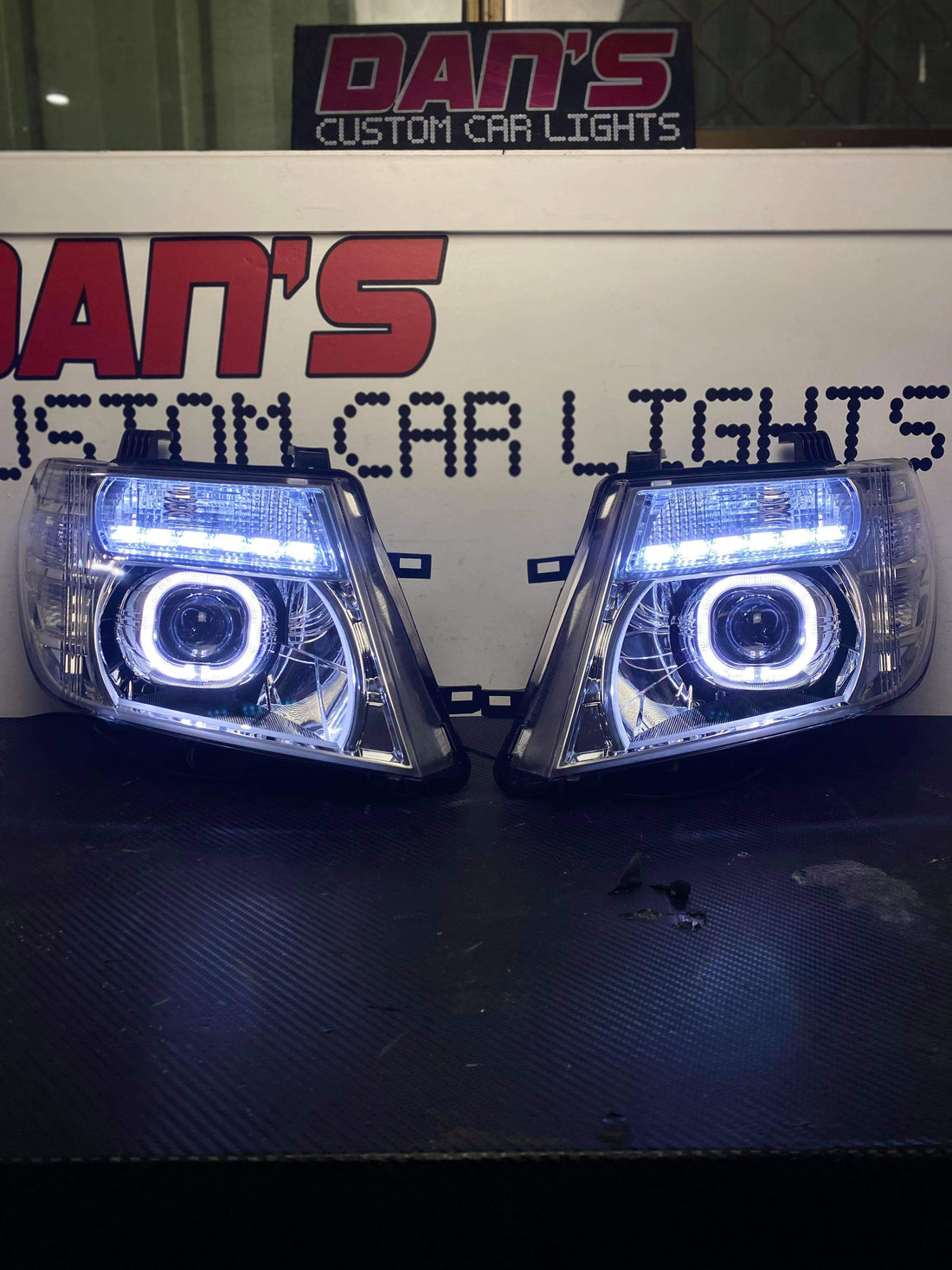 Nissan Navara D40 VSK Spain Facelift Chrome Headlights with White/Amber Halo Rings, DRLS and Projectors - Dan's Custom Car Lights 