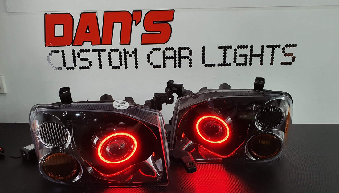 Nissan Navarra D22 Headlights with Multicoloured Halo Rings - Dan's Custom Car Lights 